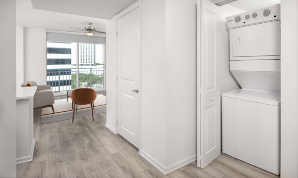 Stacked washer and dryer in the studio apartments at Camden Las Olas in Fort Lauderdale, FL.
