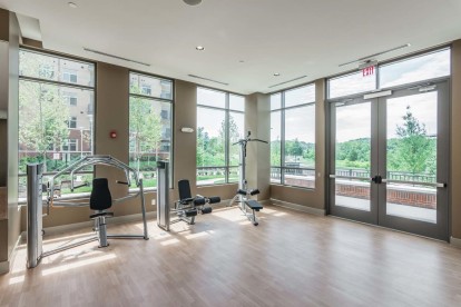 Two-story fitness center with strength training equipment