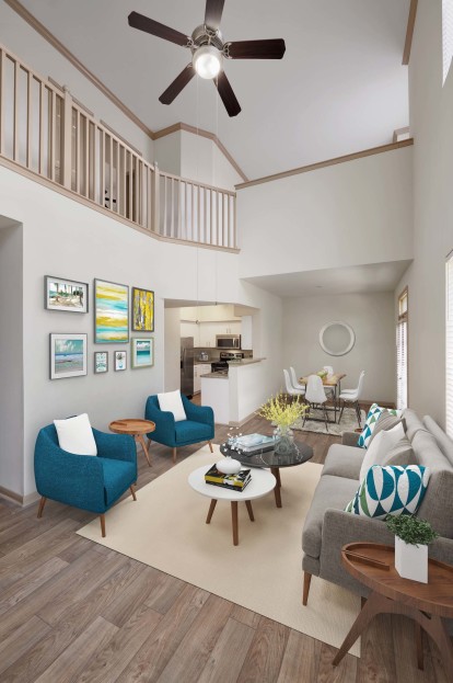 Townhome living room with high ceilings at Camden Holly Springs Apartments in Houston, TX
