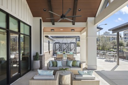 Outdoor resident lounge at Camden Woodmill Creek homes for rent in Spring, TX
