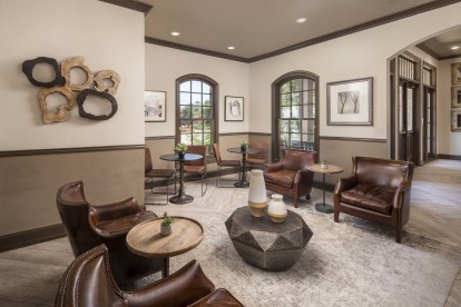Community clubroom with plenty of seating at Camden Brushy Creek apartments in Austin, TX