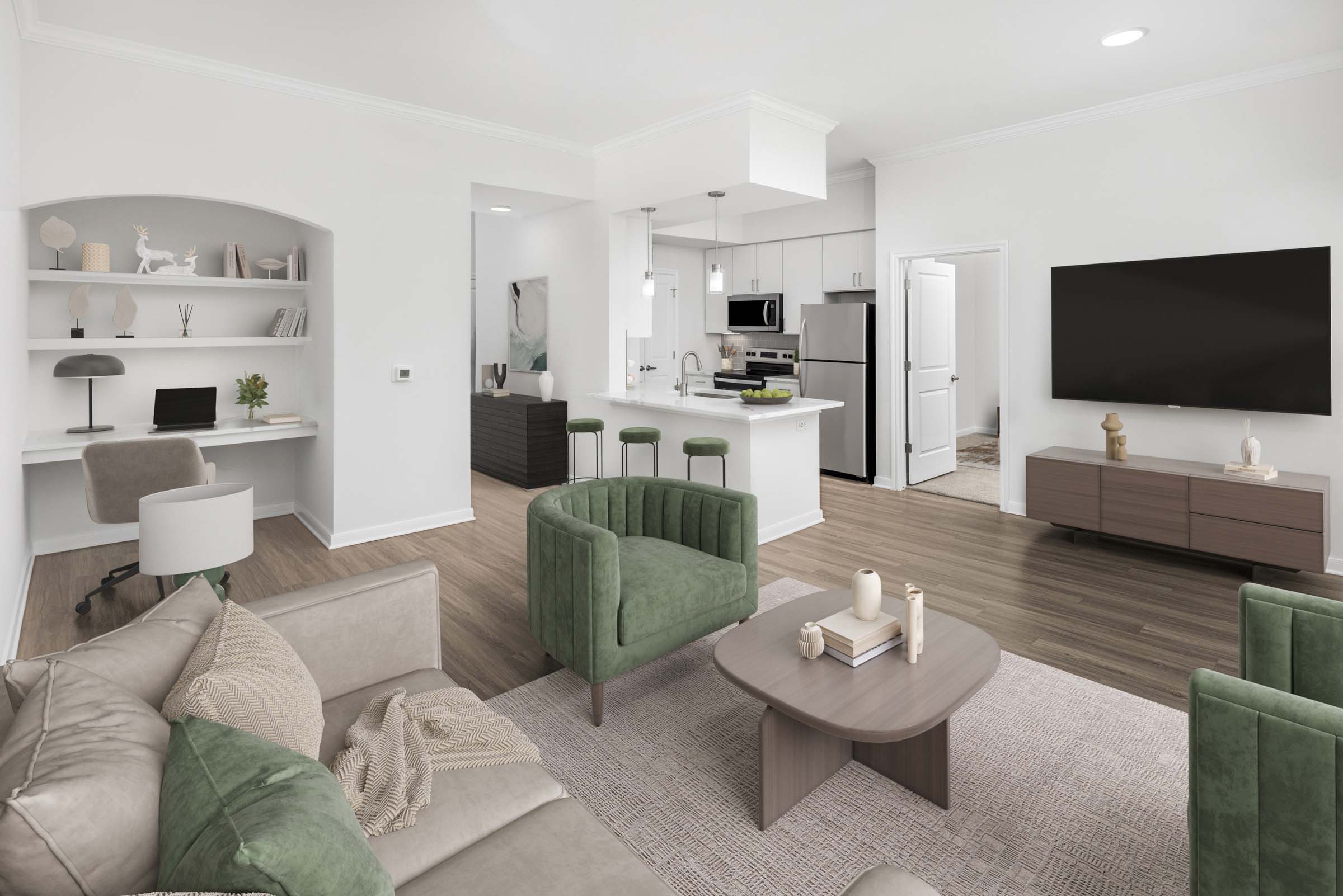 Open concept kitchen, dining and living room with built-in desk at Camden Travis Street apartments in Houston, TX