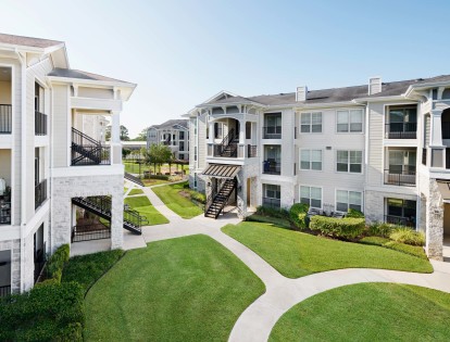 Exterior green space at Camden Northpointe Apartments in Tomball, TX
