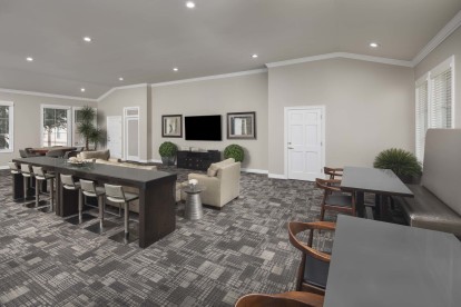 Resident Lounge and Community Workspace with space to work from home at Camden Greenway Apartments in Houston, TX