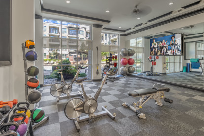 24 hour fitness center with yoga and spin zone