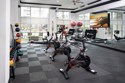 24 hour fitness center with yoga and peloton bikes