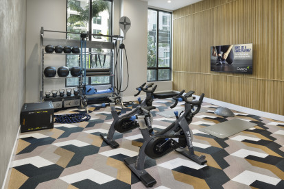 Yoga and spin studio with interactive fitness classes at Camden Atlantic apartments in Plantation, Florida.