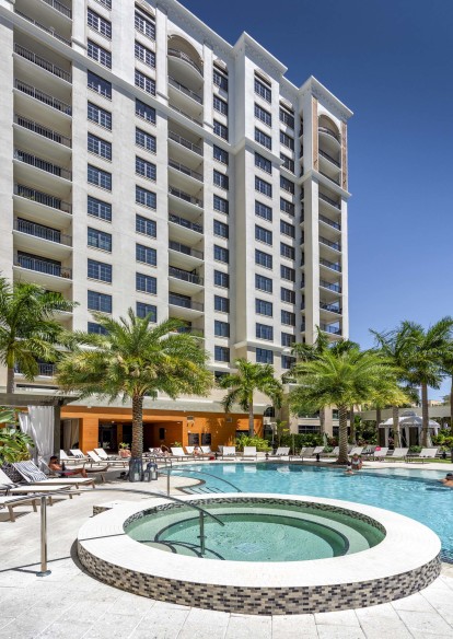 Visit the pool and feel like you are in the tropics with breezy palm trees, hot tub, and private cabanas at Camden Central Apartments in St. Petersburg, FL.