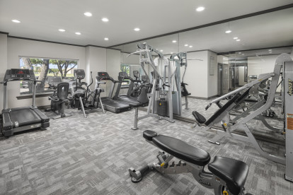24-Hour Fitness center with cardio and strength equipment