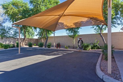 Covered car care center with hose and dryer