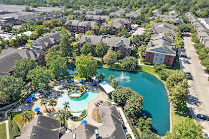 Aerial View of private lake and community of Camden Holly Springs Apartments and Townhomes in Houston, Tx