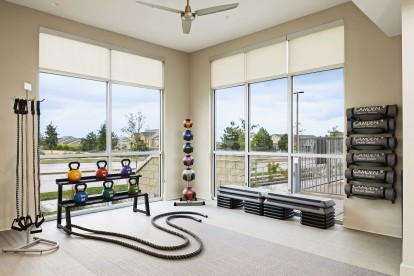 Fitness center yoga and cardio equipment at Camden Lincoln Station Apartments in Lone Tree, CO