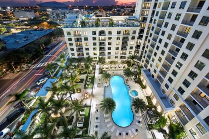 View of the pool and Central Avenue at Camden Central Apartments in St. Petersburg, FL.