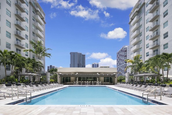 Pool with expansive pool deck at Camden Brickell apartments in Brickell, FL
