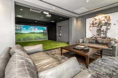 Play games on the golf and game simulator at Camden Central Apartments in St. Petersburg, FL.