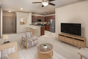 Open- concept living room at Camden Cypress Creek Apartments in Cypress, Tx
