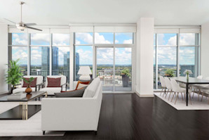 Penthouse spacious living and dining with long balcony overlooking midtown at Camden Music Row apartments in Nashville, TN