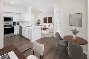 Dining area with small table and desk work space at Camden Centreport apartments in Fort Worth, TX