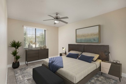 Main bedroom with lighted ceiling fan 