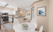 Kitchen with dining space at Camden Holly Springs Apartments in Houston, TX