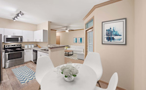 Kitchen with dining space at Camden Holly Springs Apartments in Houston, TX