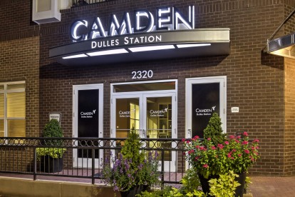 Camden Dulles Station outdoor exterior building photo at night.  