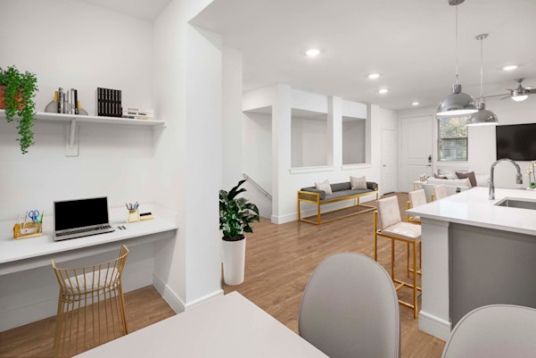 Villas townhome dining room with built-in desk and view toward the private garage stairs at Camden Greenville