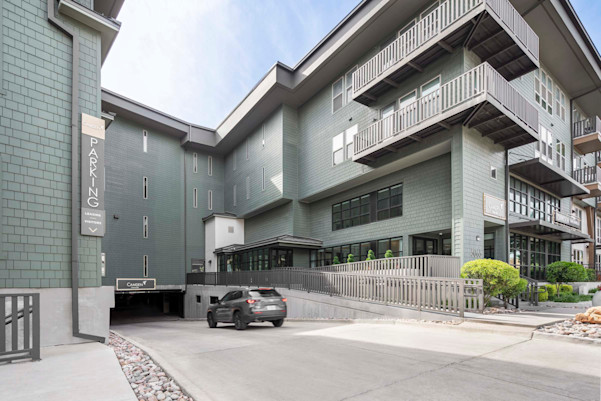Underground gated parking garage entry at Camden Greenville apartments in Dallas, TX