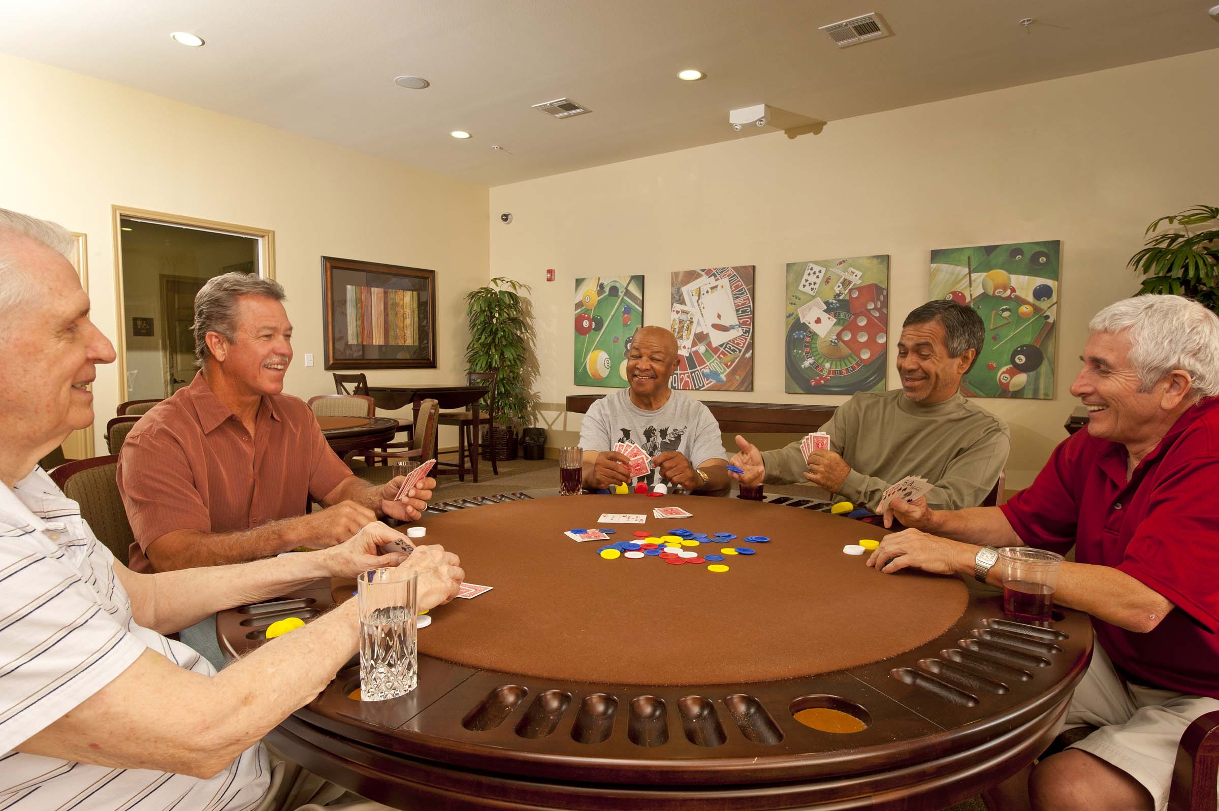 Poker tables in resident lounge for game night