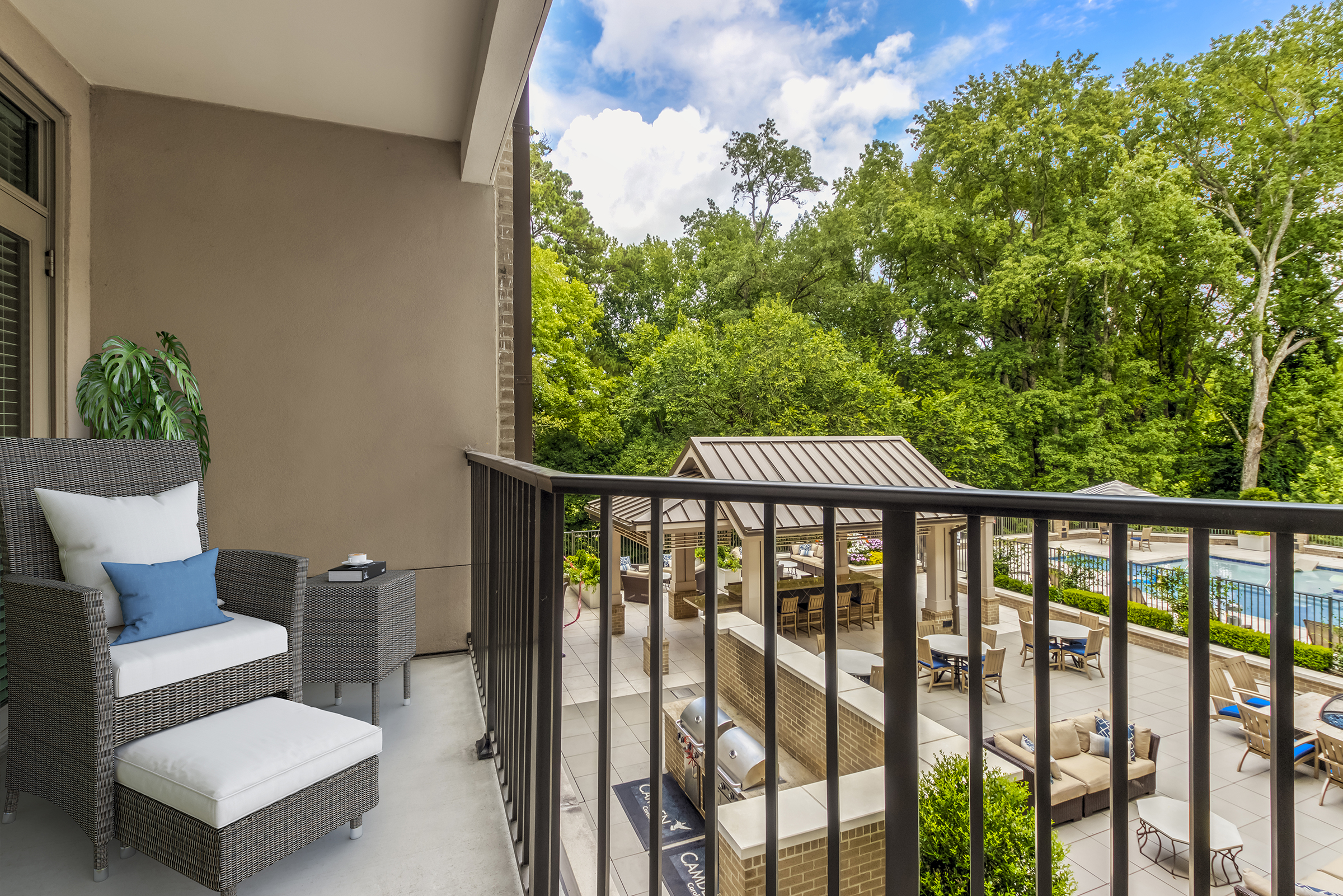 Balcony overlooking pool courtyard and 18th hole of Carolina Country Club