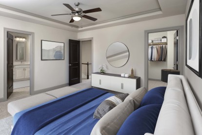 Townhome bedroom with walk-in closet and ensuite bathroom