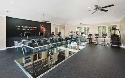 Multi-Level 24-hour Fitness Center with cardio equipment at Camden Greenway Apartments in Houston, TX