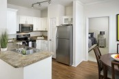 Kitchen with stainless steel appliances and large pantry