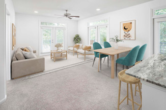 Living and dining area with a ceiling fan at Camden Monument Place apartments in Fairfax, VA