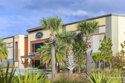 Neighborhood shopping plaza featuring EPIC movie theater near Camden Lee Vista apartments in Orlando, Florida.