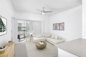 Renovated living room with adjacent patio at Camden Dunwoody in Atlanta GA