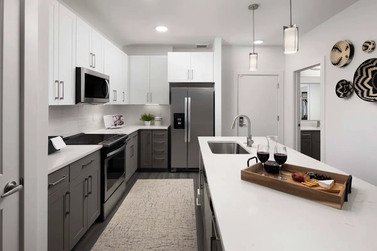 Furnished kitchen and island at Camden North End.