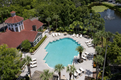 Front lakeside pool at Camden Bay apartments in Tampa, Florida.