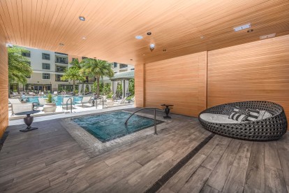 A total spa-like experience when you visit the community spa area with hot tub, sauna and steam room at Camden Central Apartments in St. Petersburg, FL.
