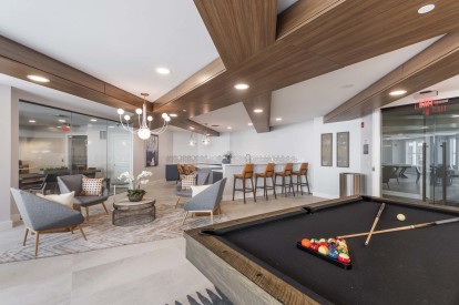 Resident lounge pool table cold brew entertaining area