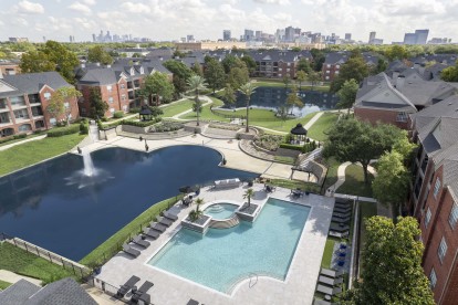 Aerial View of the community showing the lakes with fountains and pool