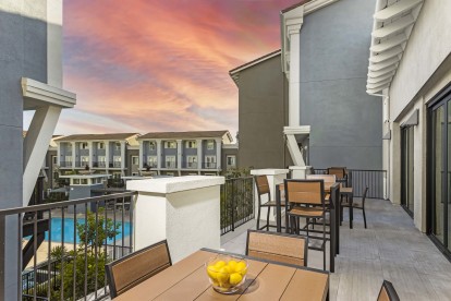 Camden Harbor View Resident Lounge Terrace with Dining and a view