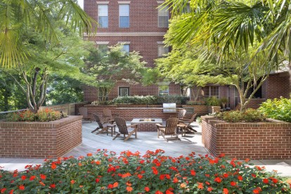 Outdoor lounge at the towers with barbeque and outdoor kitchen area