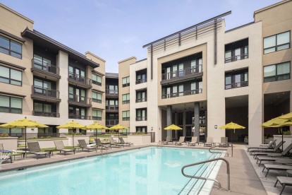 Resort style swimming pool with expansive sundeck