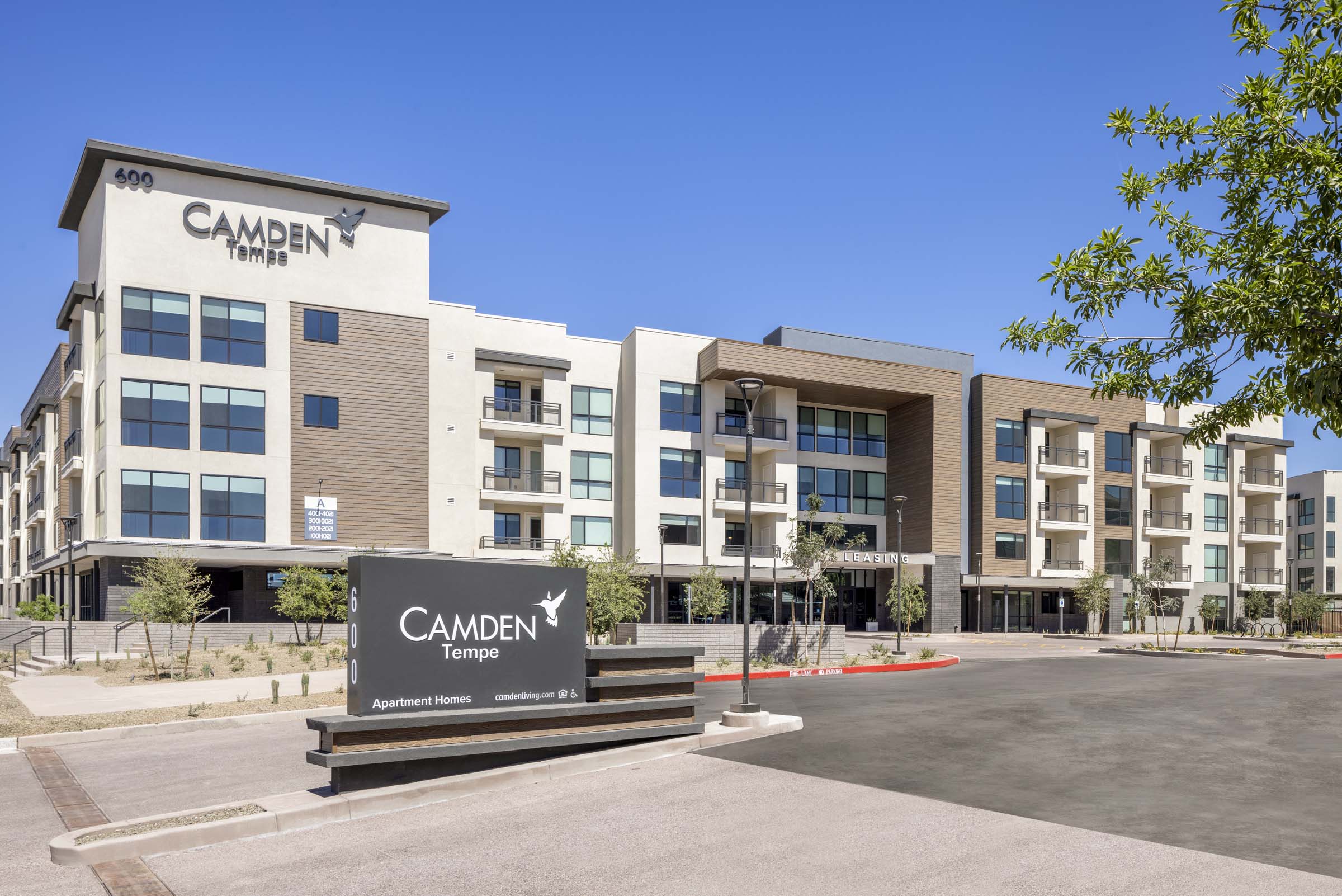 Camden Tempe West Apartments in Arizona Monument Sign and driveway near Contemporary Building 