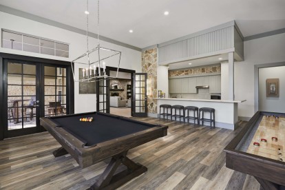 Social lounge with billiards shuffleboard and entertaining kitchen