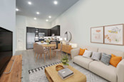 Living room, dining area, and kitchen with wood-look flooring throughout at Camden Shady Grove apartments in Rockville, MD