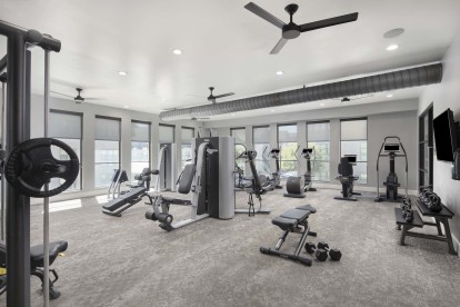 24-hour fitness center on the Villas side at Camden Greenville apartments in Dallas, TX
