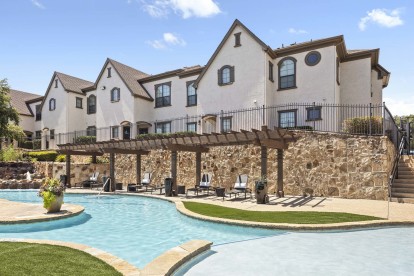 Resort-style pool with cabana seating at Camden Brushy Creek apartments in Austin, TX