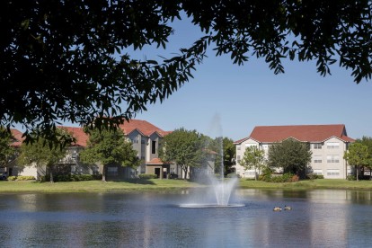 Relaxing views of lake with water feature